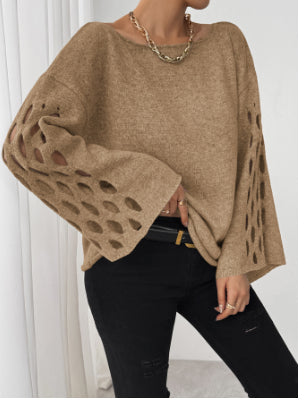 Tyra – modny, elegancki damski sweter z dekoltem w kształcie litery V i ażurowymi rękawami