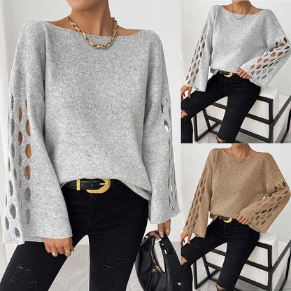 Tyra – modny, elegancki damski sweter z dekoltem w kształcie litery V i ażurowymi rękawami