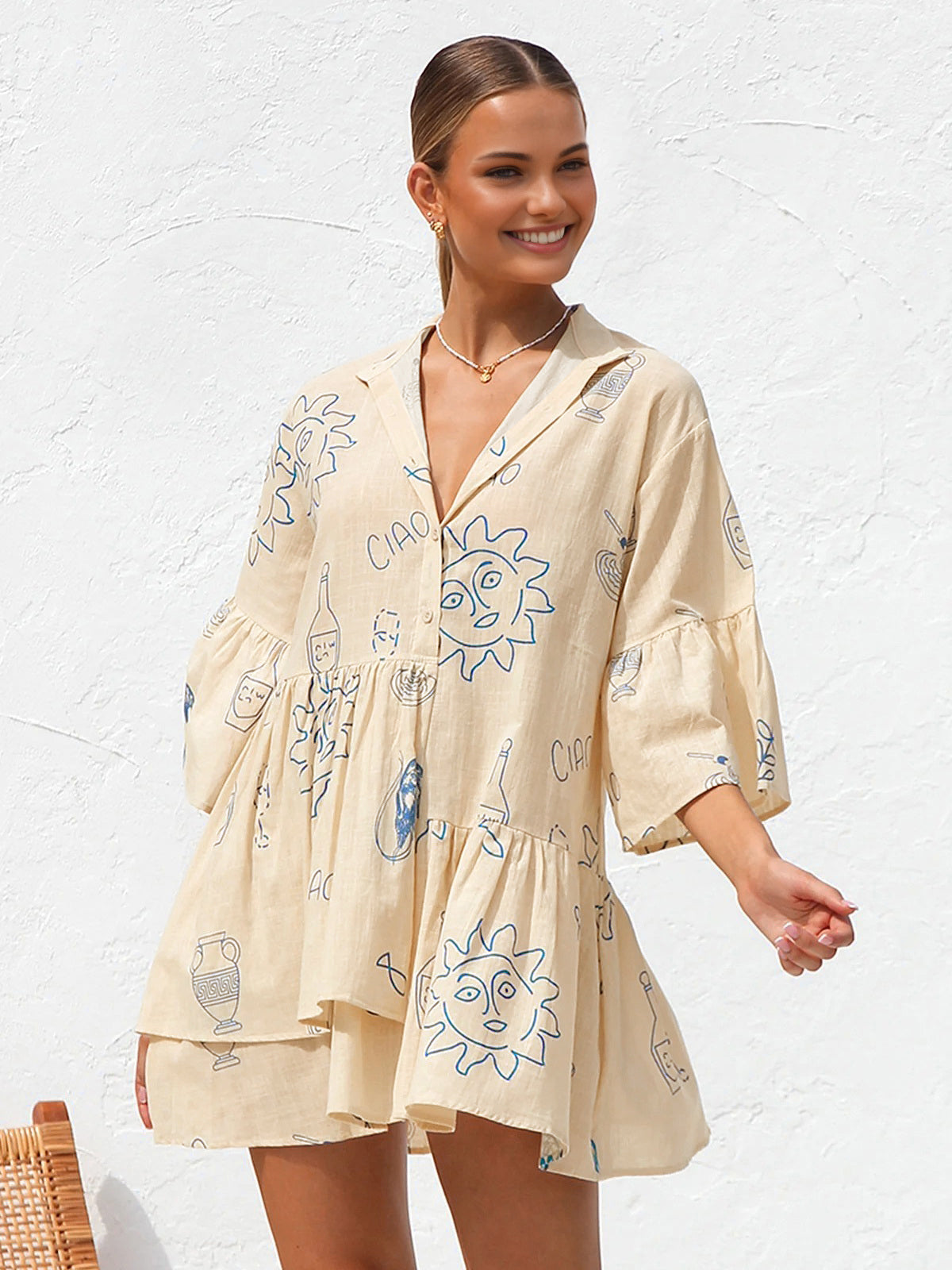 Jacqueline | Oversize’owa damska sukienka mini z nadrukiem słonecznym