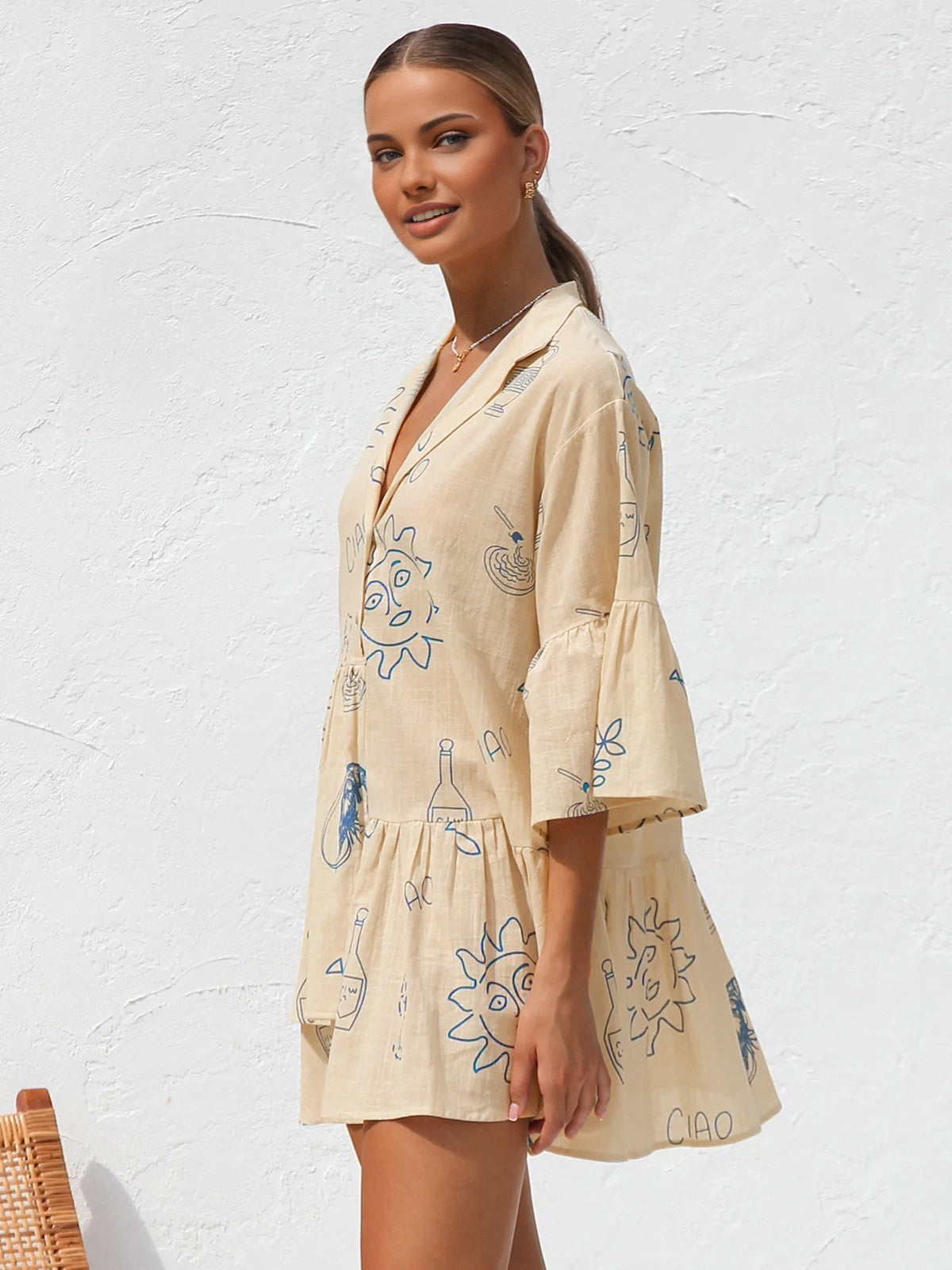 Jacqueline | Oversize’owa damska sukienka mini z nadrukiem słonecznym