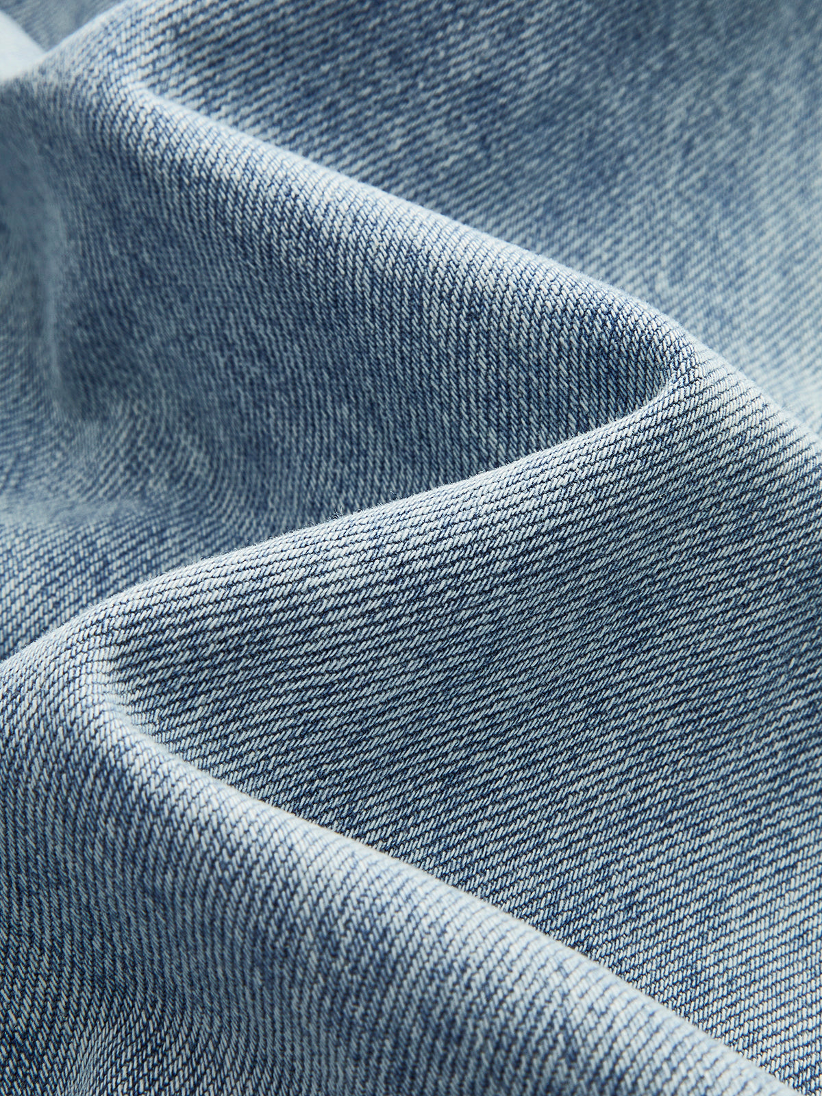Nancy | Damskie jeansy z asymetryczną talią i szerokimi nogawkami