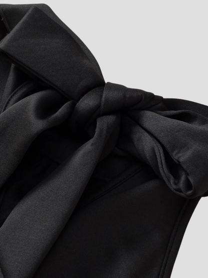 Sabina | Stylowy damski top z wiązaniem na szyi z brokatowym wykończeniem, efektowny i elegancki design