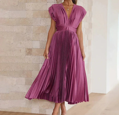 Liora - Elegancka plisowana sukienka maxi z głębokim dekoltem