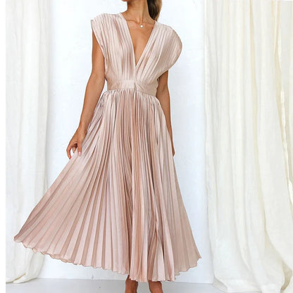 Liora - Elegancka plisowana sukienka maxi z głębokim dekoltem