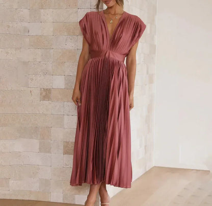 Liora - Elegancka plisowana sukienka maxi z głębokim dekoltem