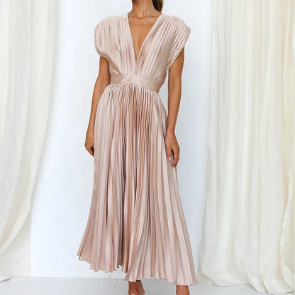 Liora - Elegancka plisowana sukienka maxi z głębokim dekoltem