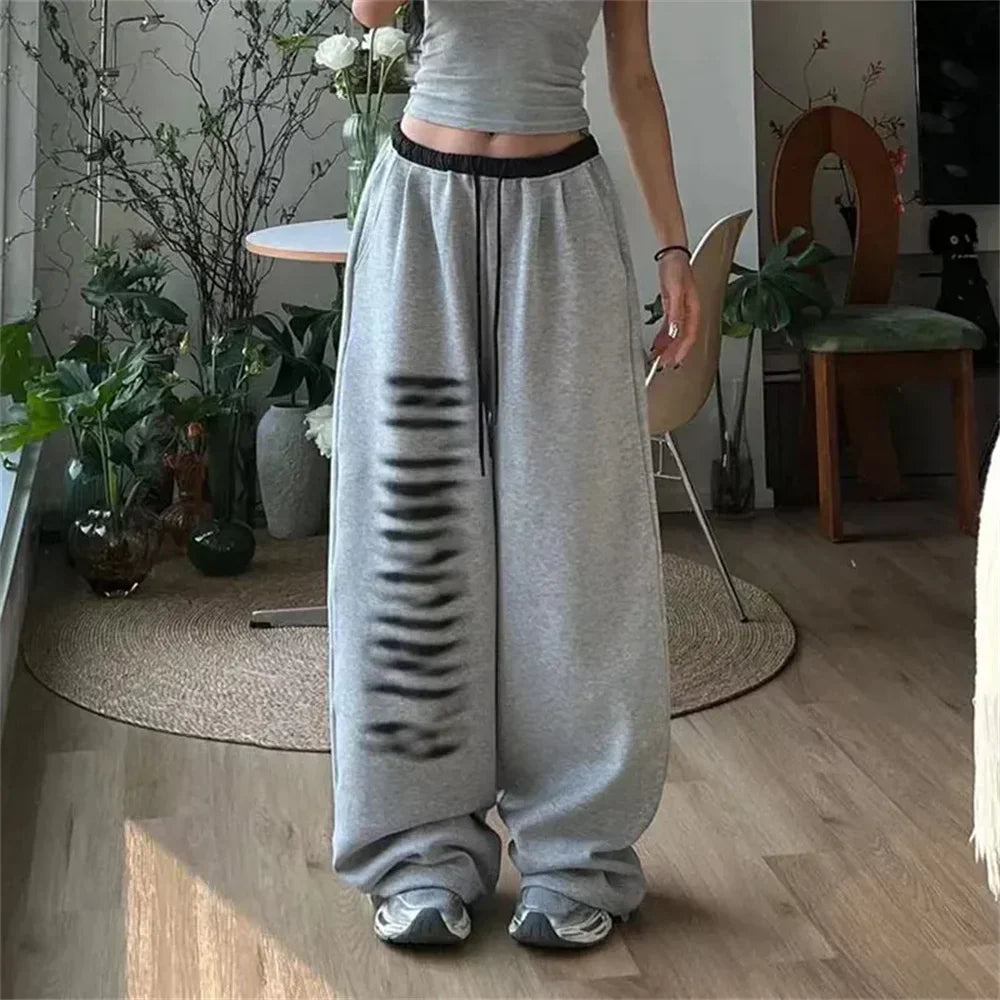 Emma - Damskie luźne spodnie dresowe