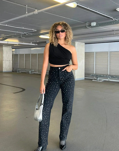 Kamila - Błyszczące jeansy slim fit z nutką glamour